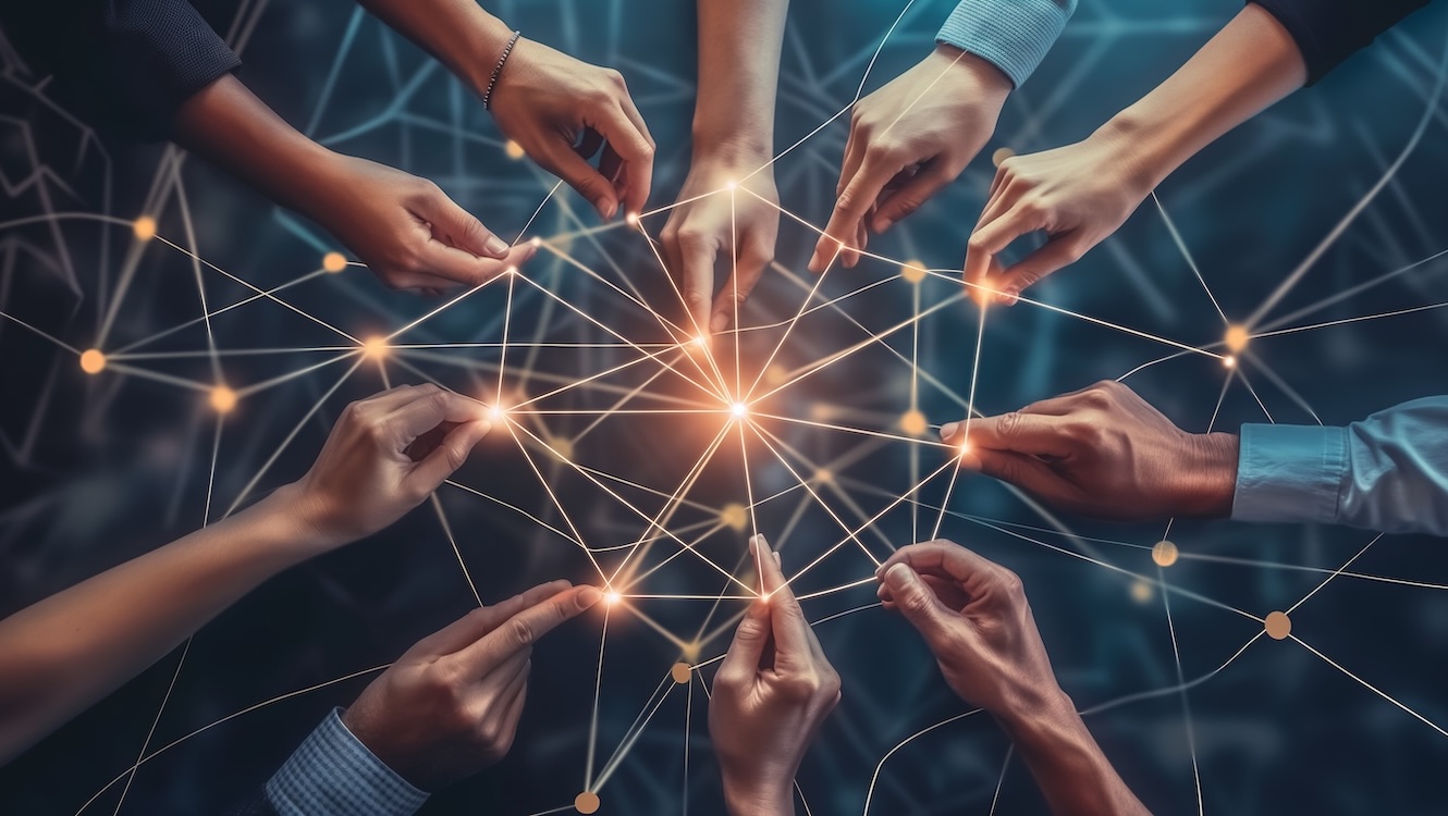 People connecting hands, symbolizing teamwork with a graphical network overlay of points and lines